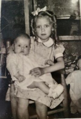 Betty holding baby Bonny, 1949
