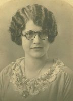 A woman in a beaded dress, 1920s portrait