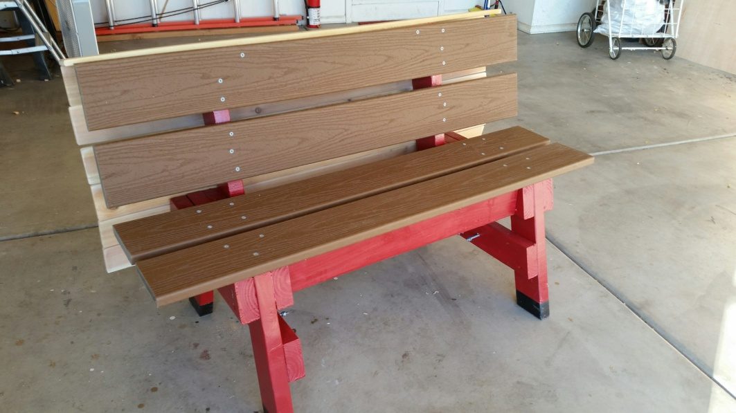 The buddy bench opened out into a slatted bench with a back